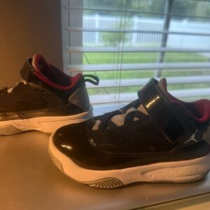 Kids Black and White Jordan’s 12c